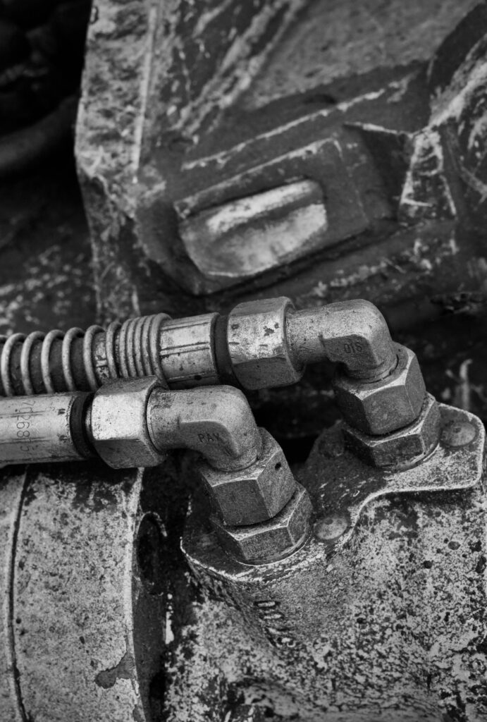 When to Replace Your Industrial & Hydraulic Hose: 5 Critical Warning Signs worn hydraulic hose fittings on machinery